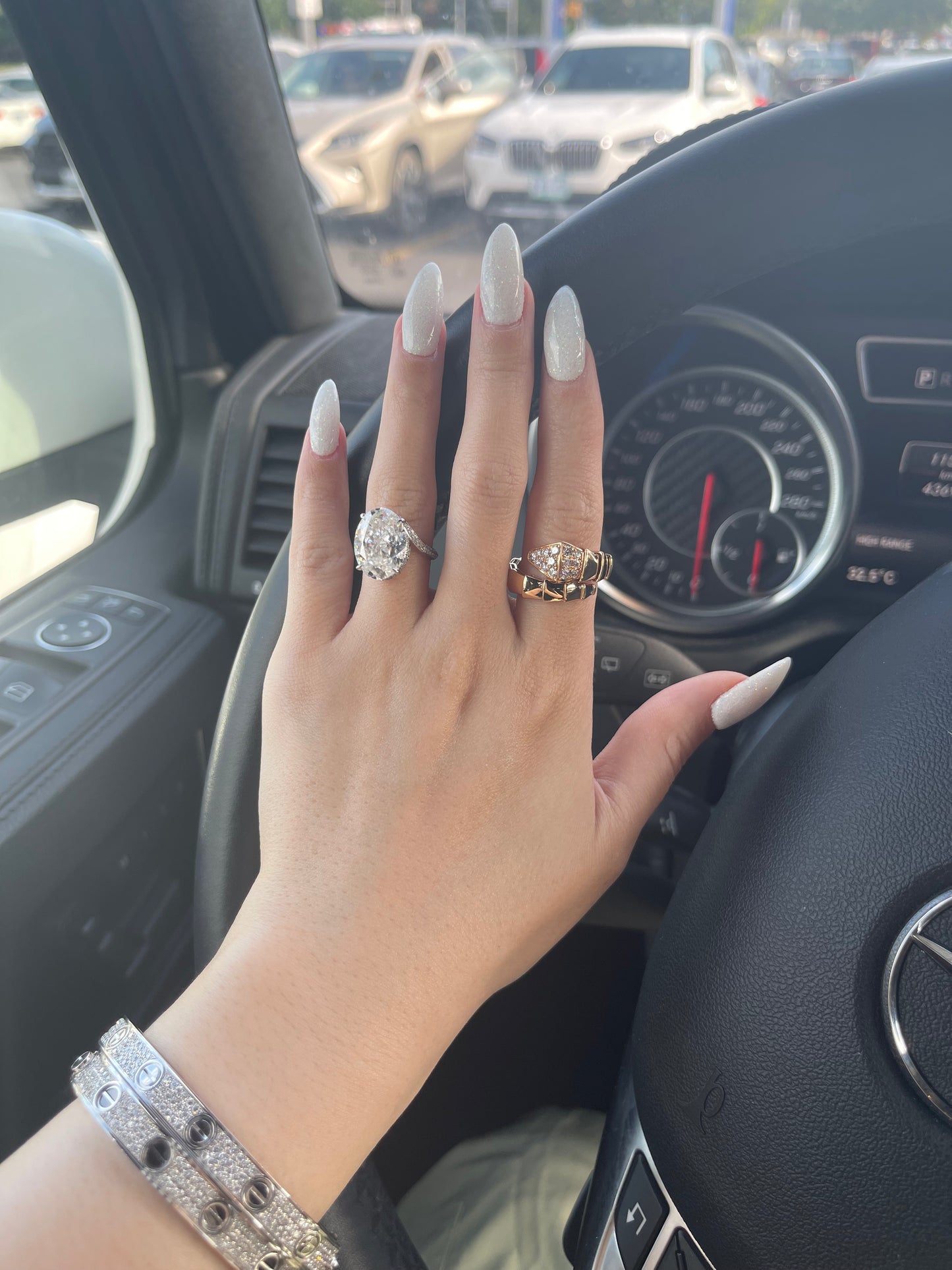 The S Signature Ring, 10 Carat, Oval, Crushed Ice