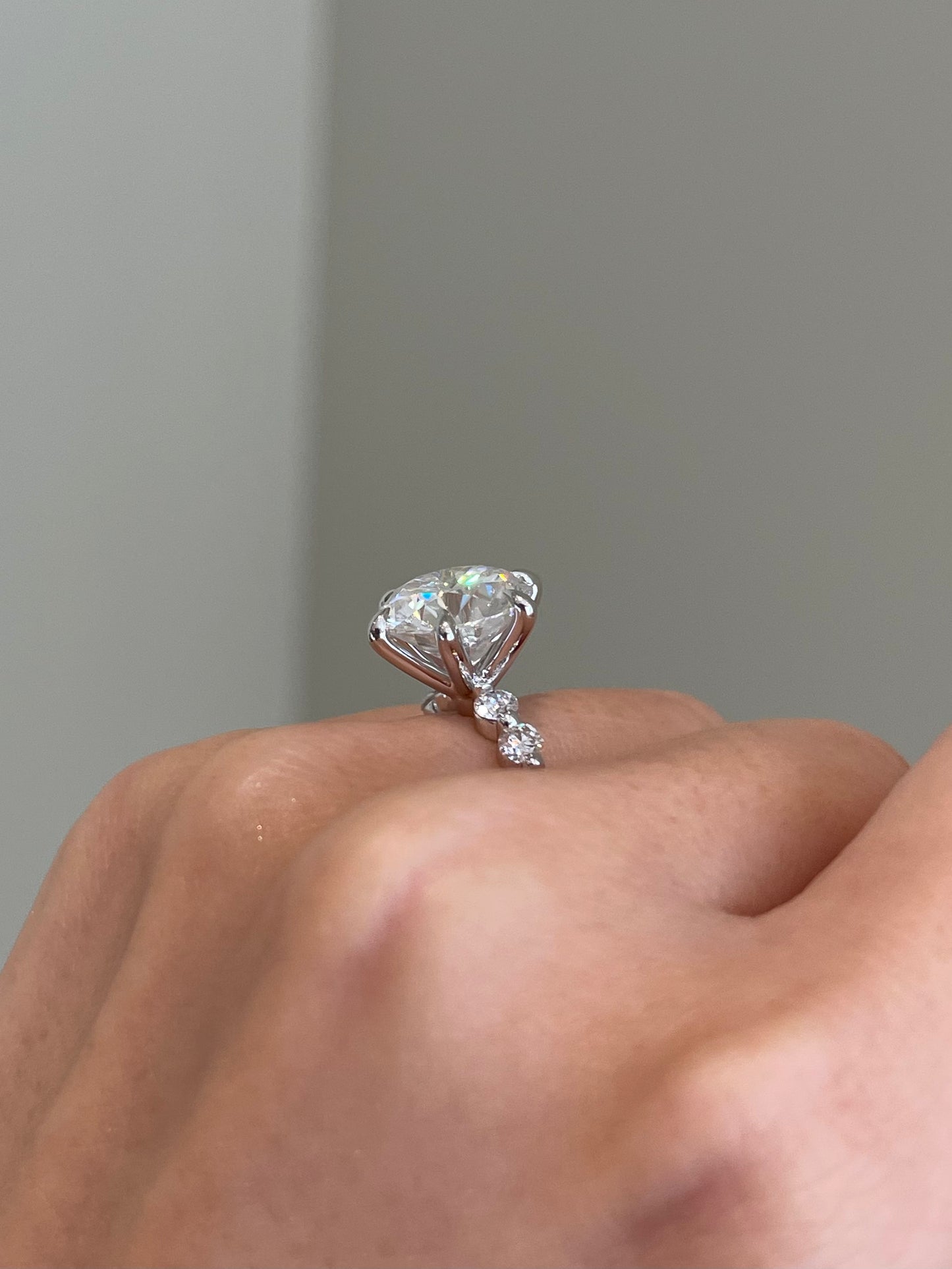 Brilliant Round Moissanite, 6-Prong Shared Prong Pavé