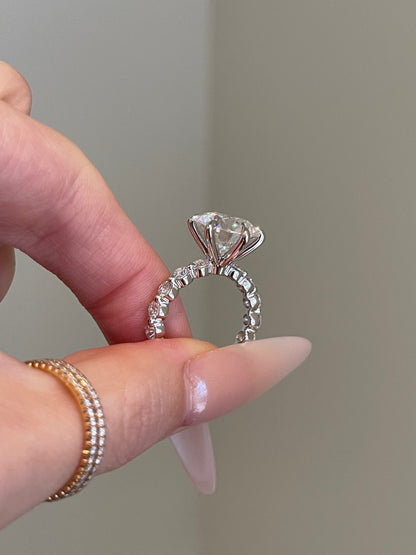 Brilliant Round Moissanite, 6-Prong Shared Prong Pavé