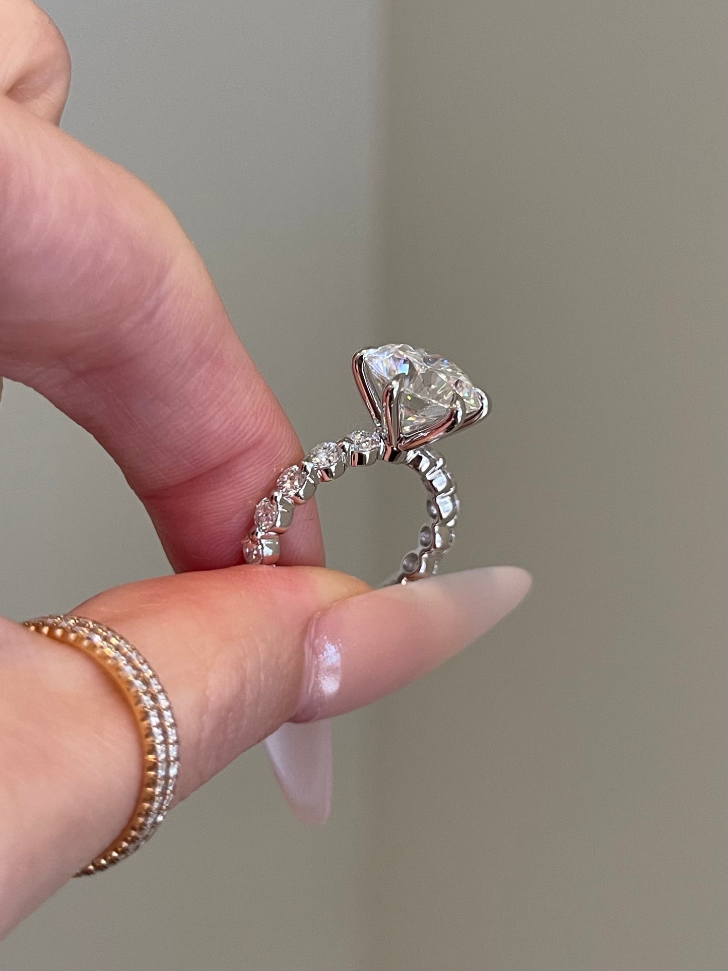 Brilliant Round Moissanite, 6-Prong Shared Prong Pavé